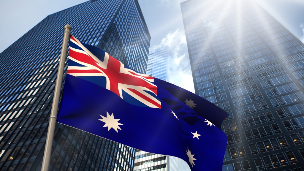 Australian flag against a city skyline